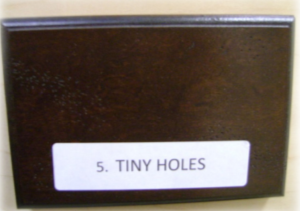 tiny holes distressing element