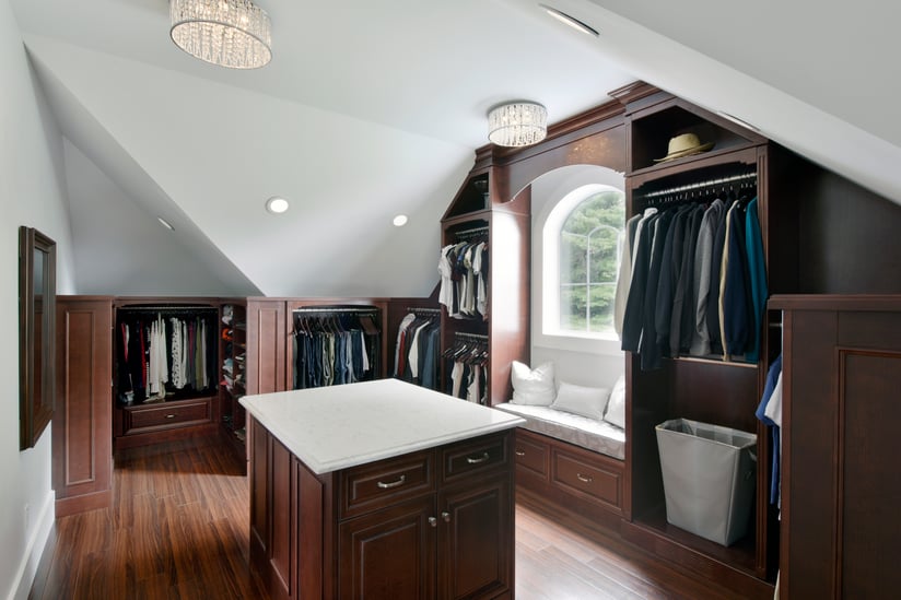 A custom closet with an irregular shape and layout