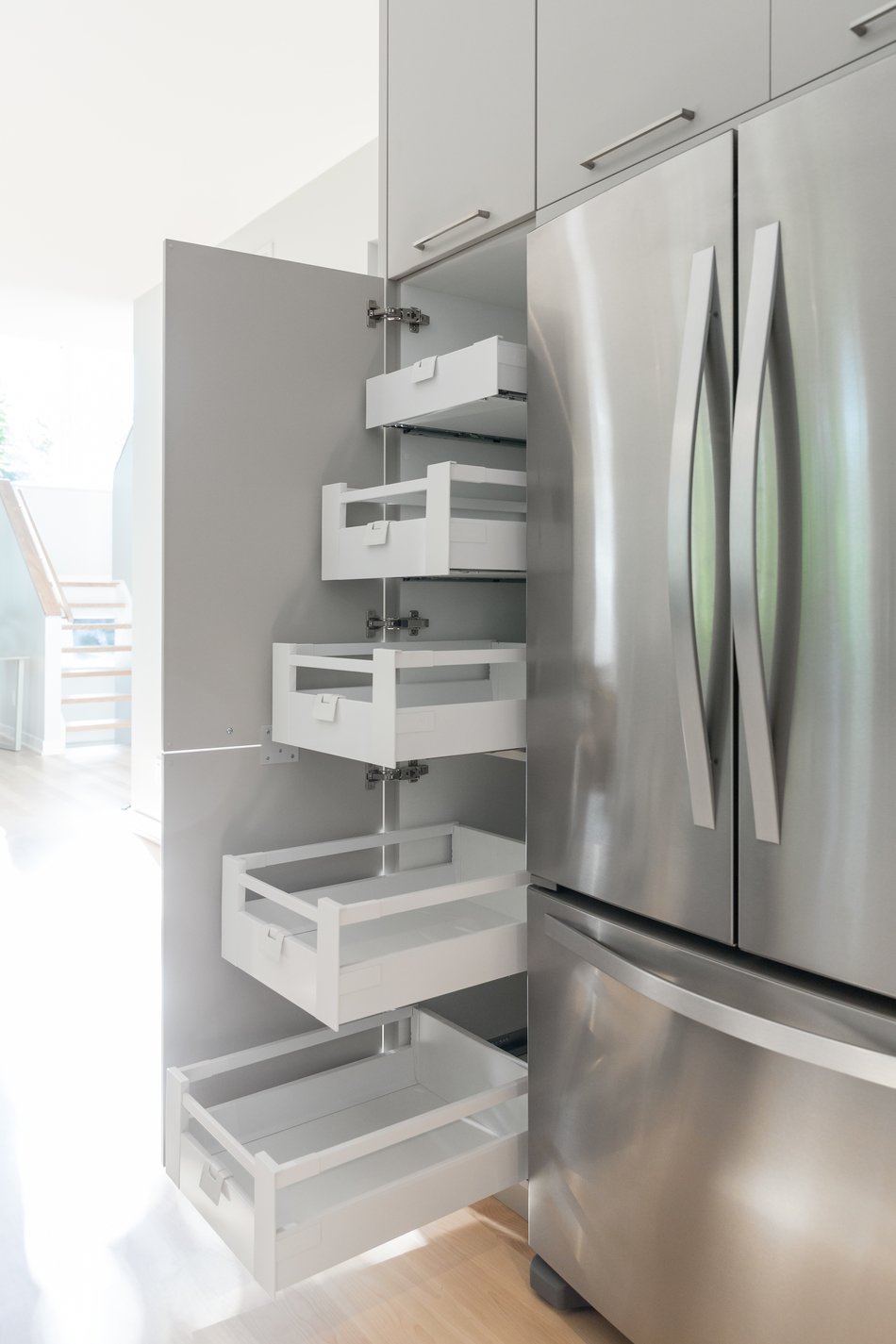 A pantry with roll-out shelves