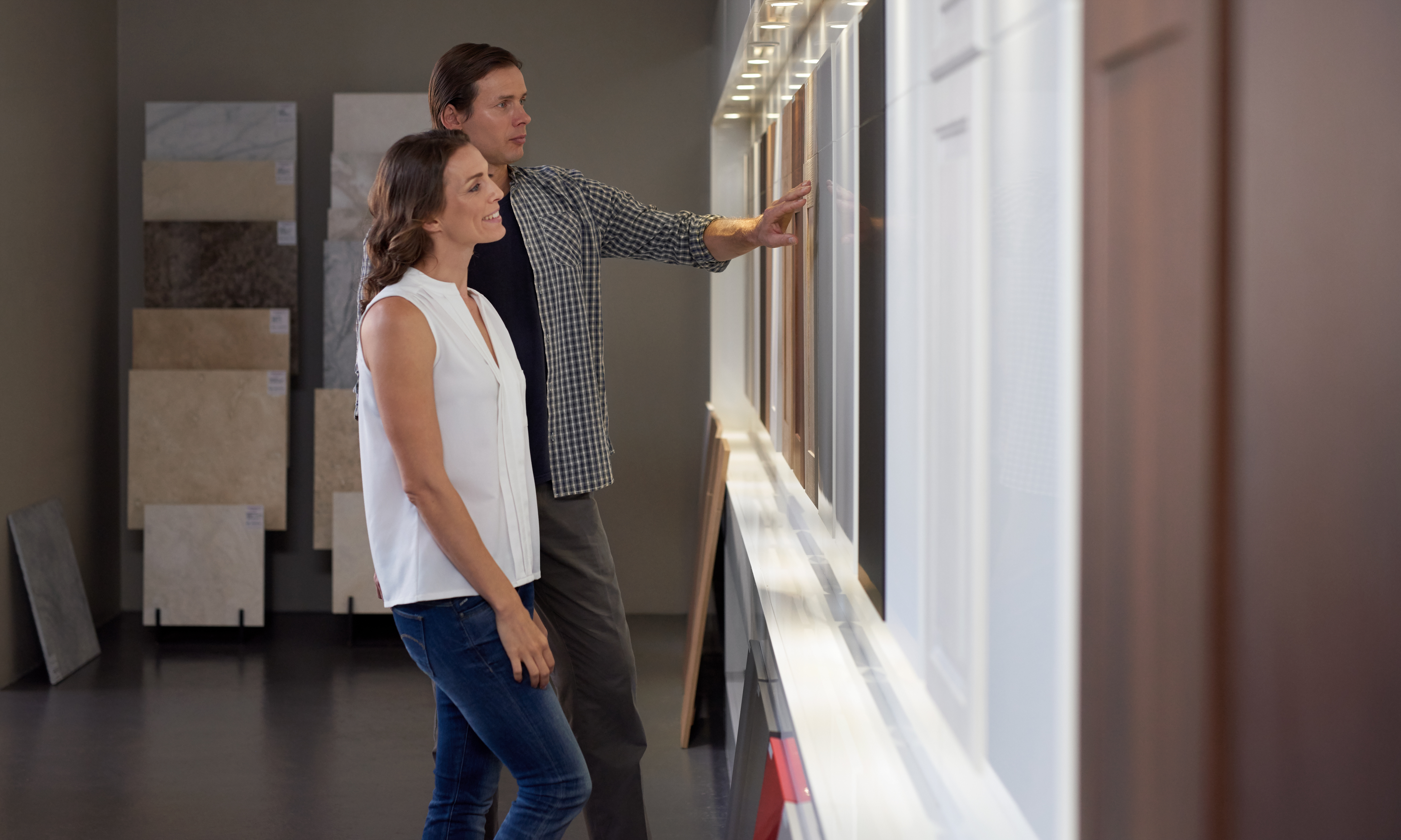 Homeowners exploring kitchen design options.