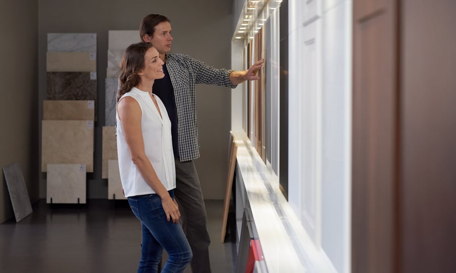 Homeowners exploring kitchen design options.