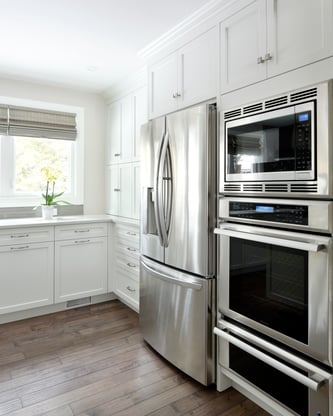 A kitchen with full-height cabinets.