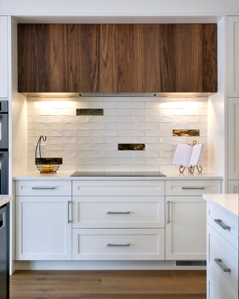 white kitchen with walnut accents