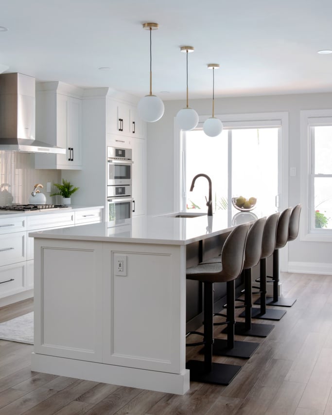 A custom kitchen island with a stone countertop