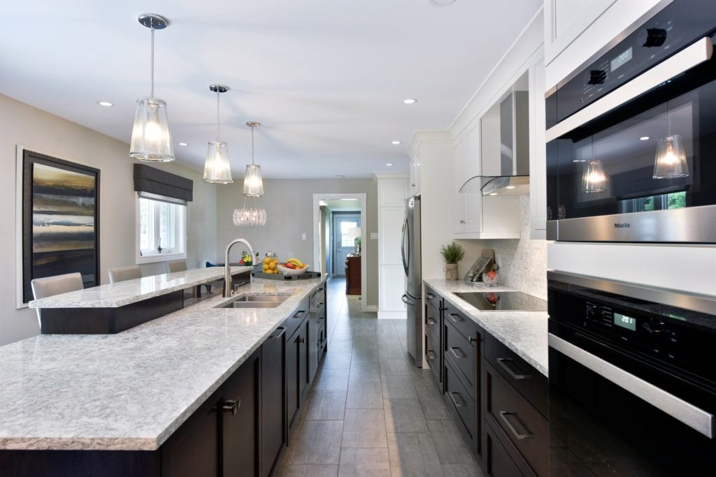 A Deslaurier design with Chocolate-stained base cabinets.