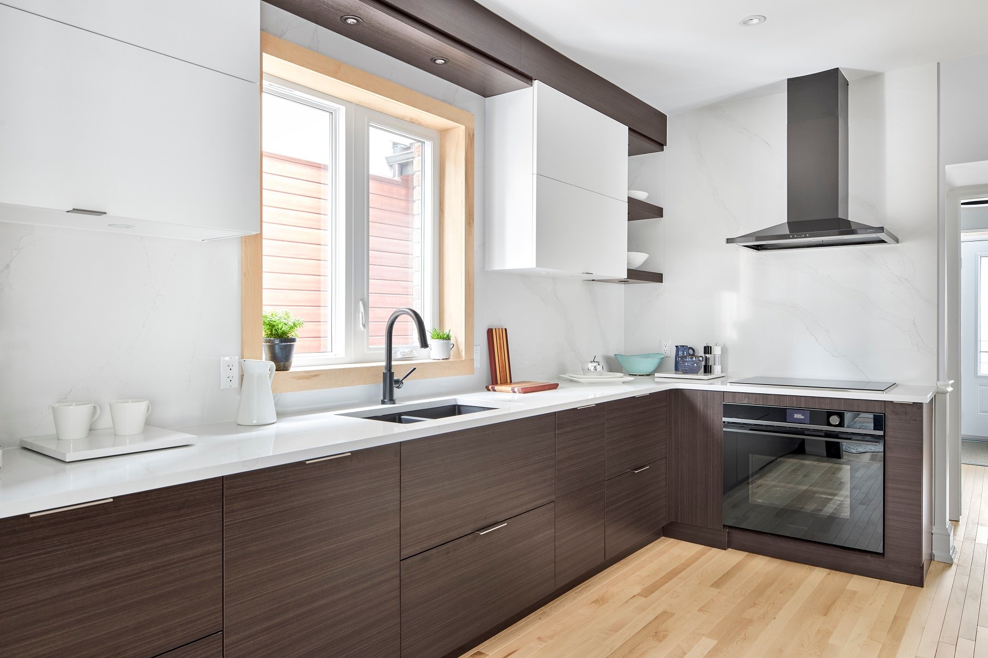 A kitchen with slab-style doors