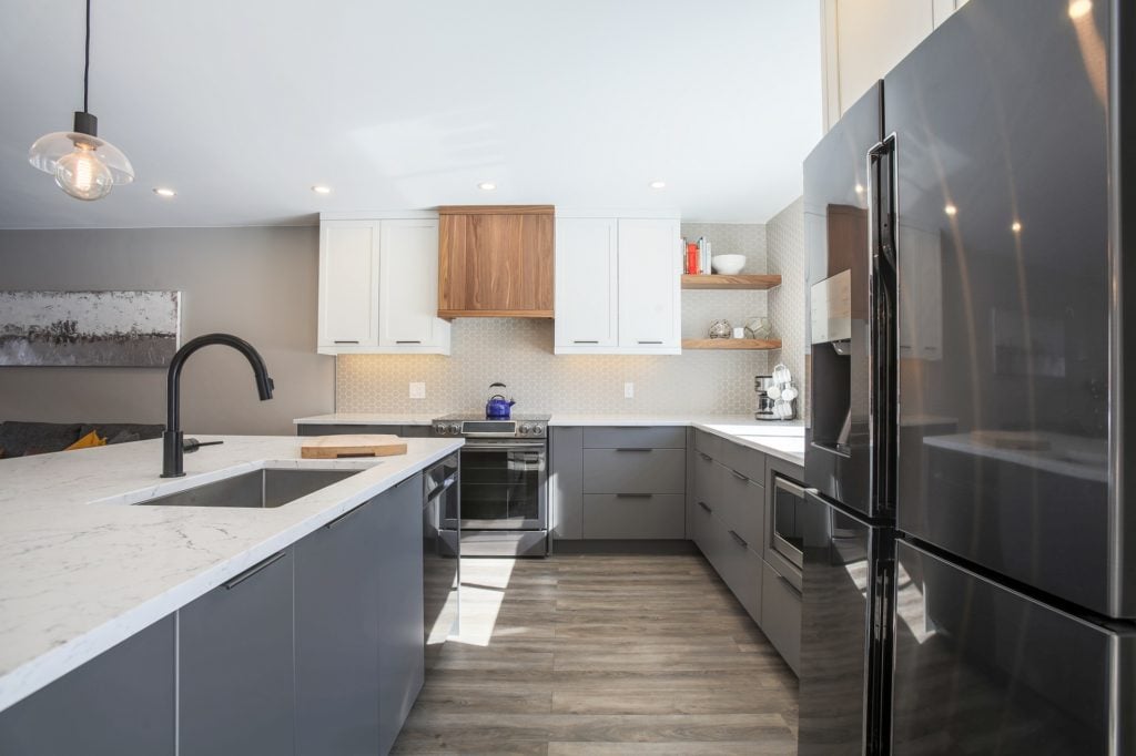 A kitchen with thermofoil base cabinets.