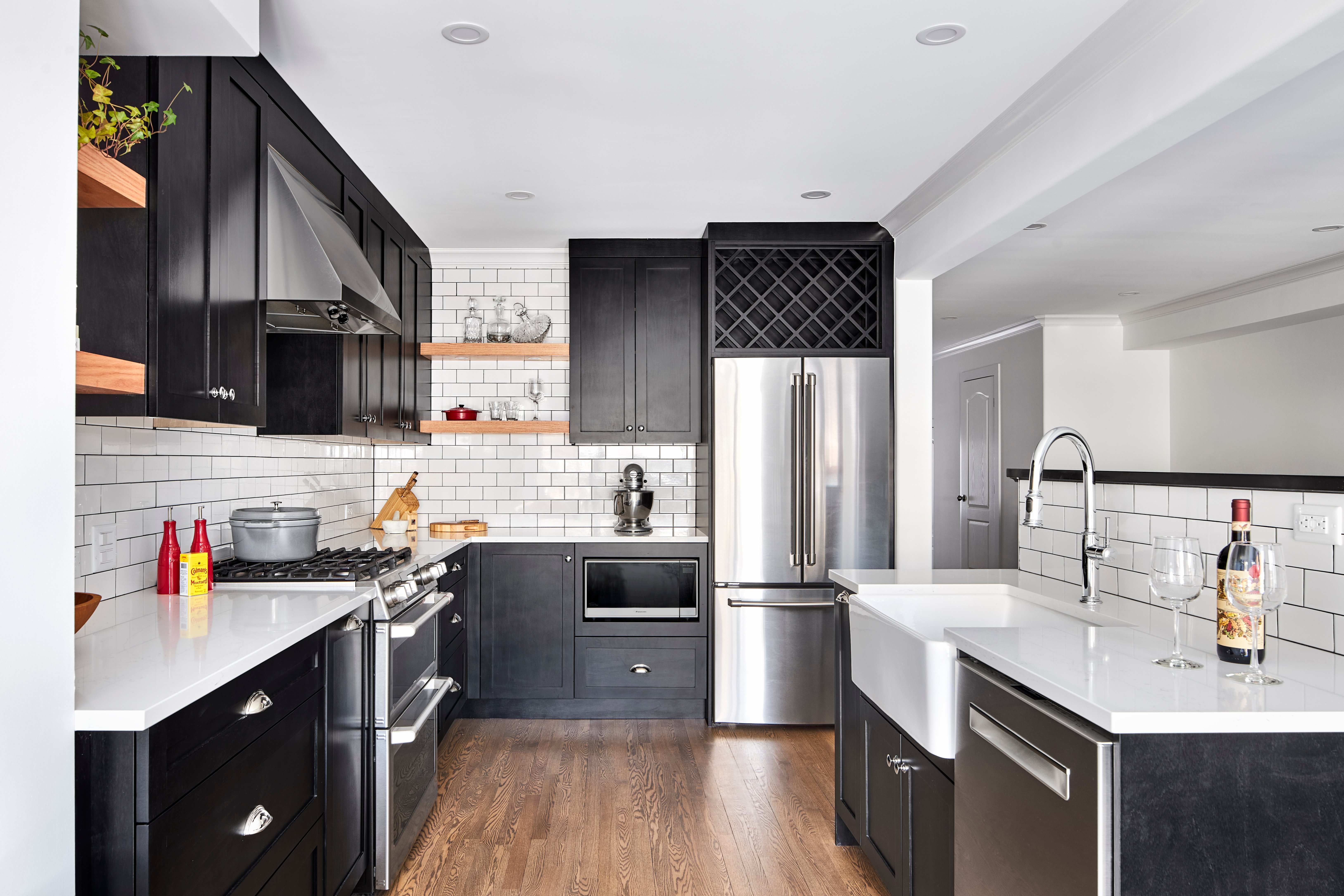 A classy, custom kitchen with Ebony-stained cabinets.