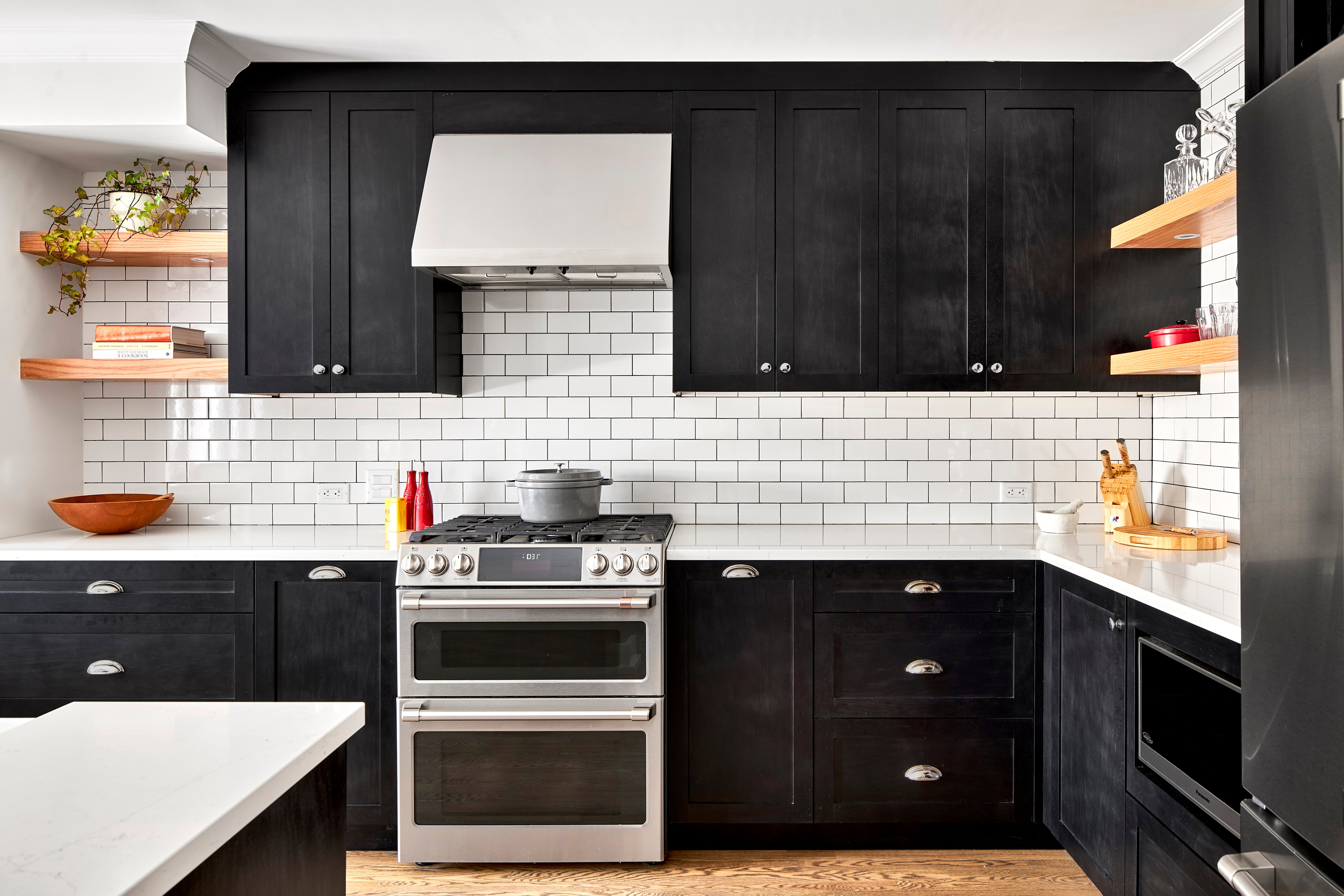 A contemporary, black and white transitional kitchen.