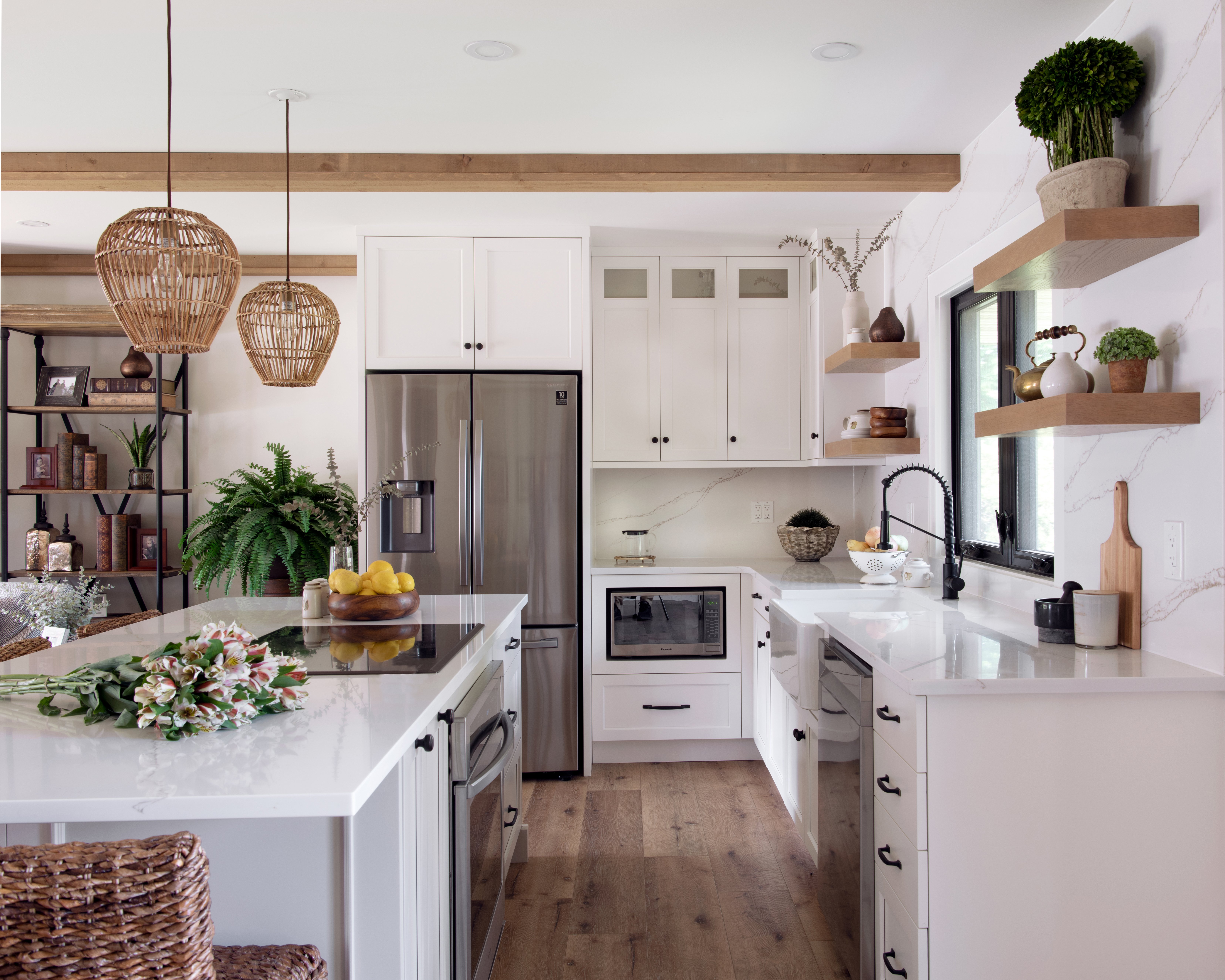 A custom kitchen with custom stained floating shelves.