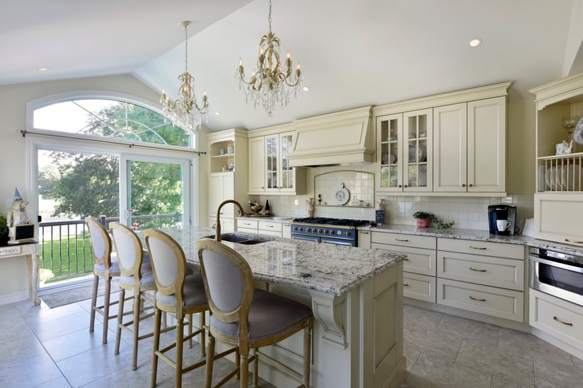 A kitchen island with traditional corbels