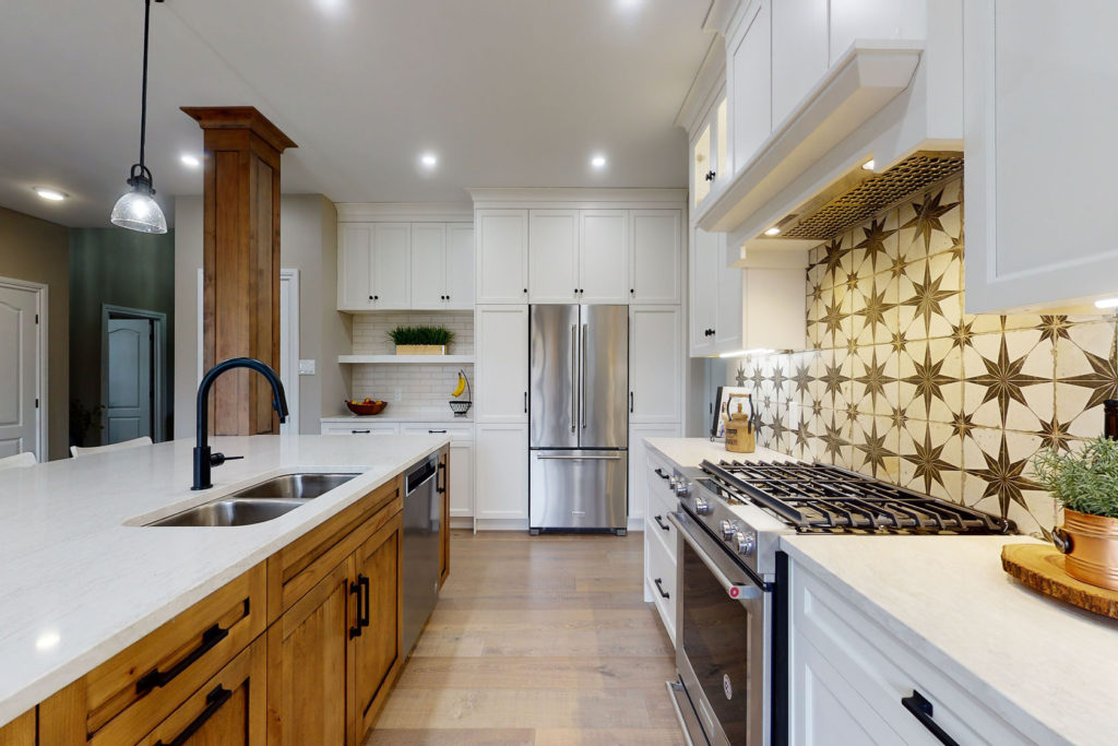 A modern farmhouse kitchen design by Deslaurier.