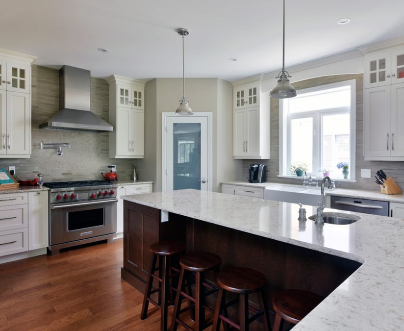 Glass inserts on stacked upper cabinets.